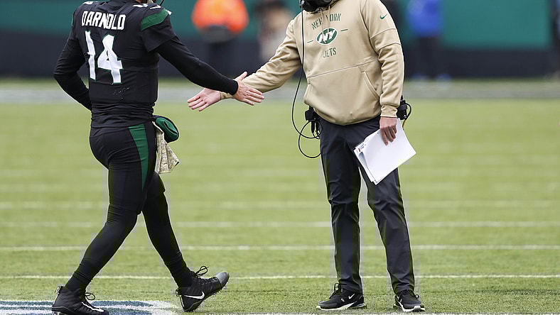 Sam Darnold and Adam Gase shake hands