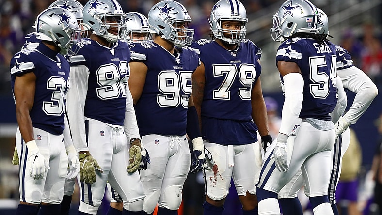 Dallas Cowboys huddle during game