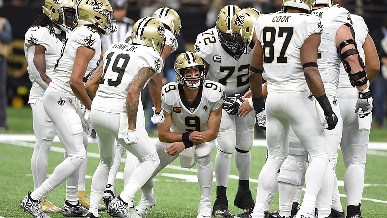 New Orleans Saints quarterback Drew Brees with his teammates