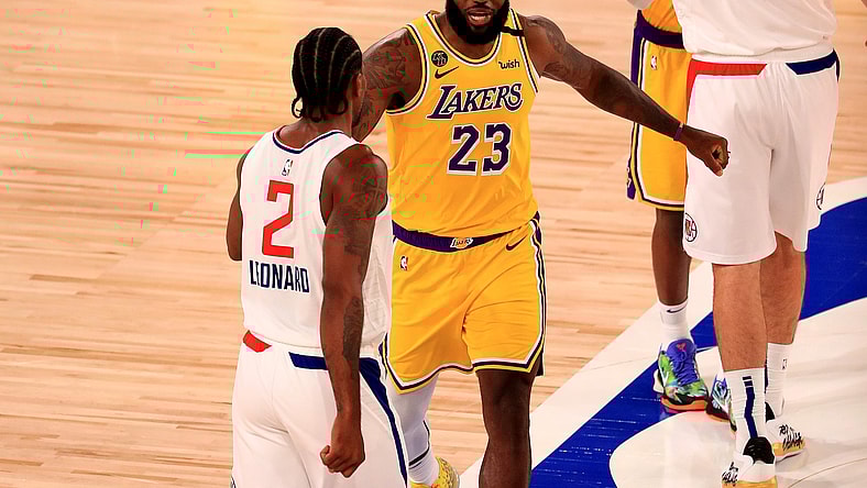 Lakers star LeBron James and Kawhi Leonard of Clippers during NBA game