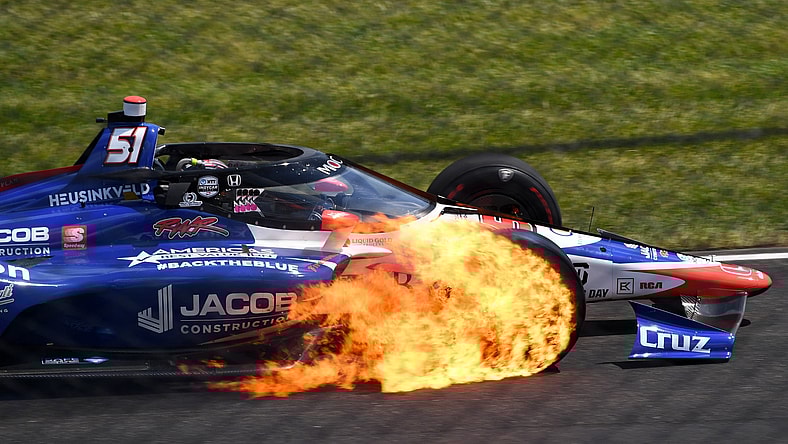 Indy Series driver James Davison 's tire catches fire during Indianapolis 500