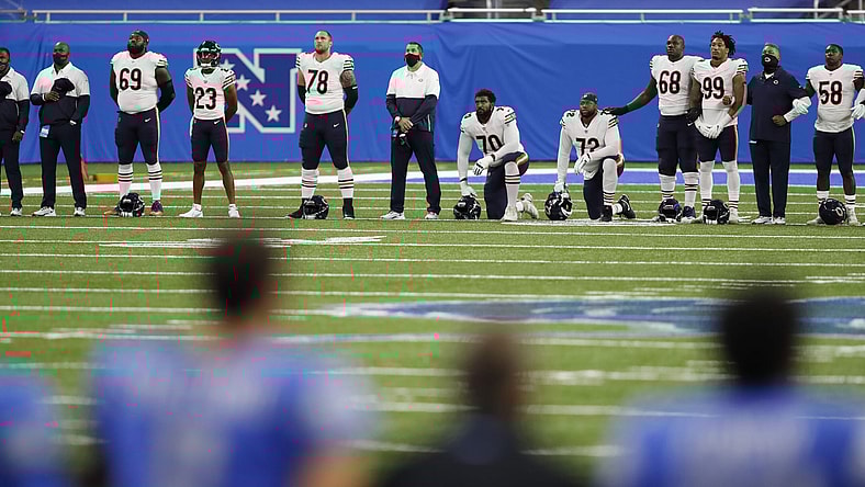 Chicago Bears and Detroit Lions players demonstrate in Week 1