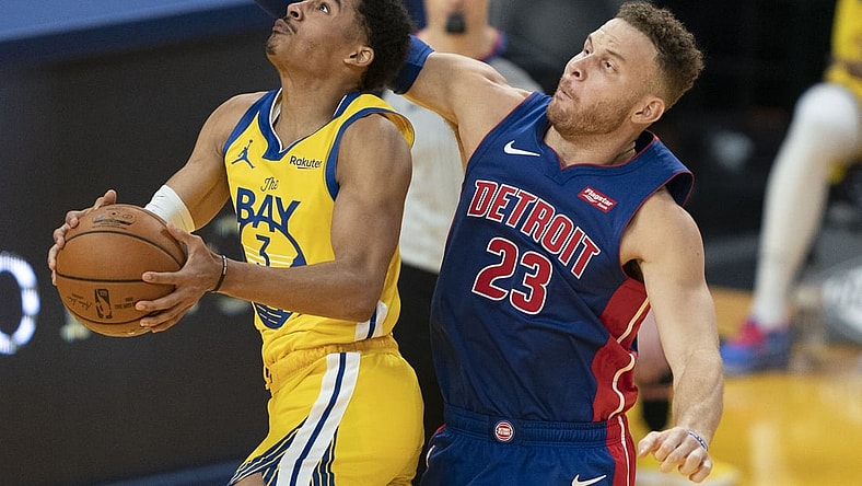 January 30, 2021; San Francisco, California, USA; Golden State Warriors guard Jordan Poole (3) shoots the basketball against Detroit Pistons forward Blake Griffin (23) during the second quarter at Chase Center. Mandatory Credit: Kyle Terada-USA TODAY Sports