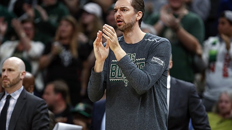 Mar 9, 2019; Milwaukee, WI, USA; Milwaukee Bucks center Pau Gasol (17) applauds his team against the Charlotte Hornets during the first half at Wisconsin Entertainment and Sports Center. Mandatory Credit: Kamil Krzaczynski-USA TODAY Sports