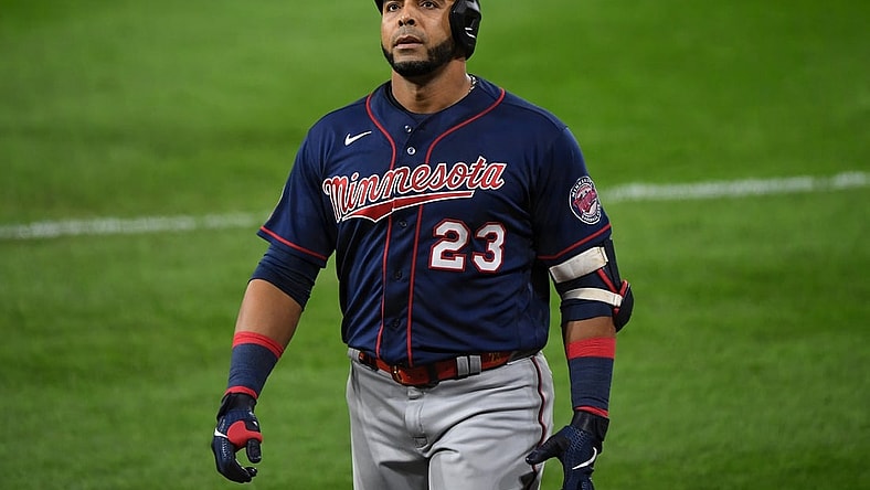 Sep 16, 2020; Chicago, Illinois, USA; Minnesota Twins designated hitter Nelson Cruz (23) reacts after an out against the Chicago White Sox during the third inning at Guaranteed Rate Field. Mandatory Credit: Mike Dinovo-USA TODAY Sports