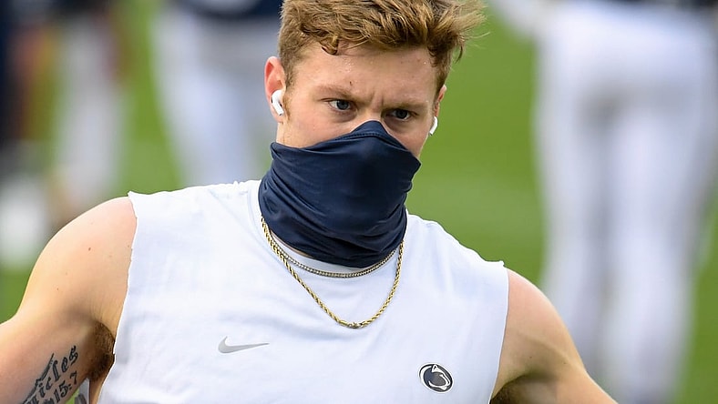 Nov 21, 2020; University Park, Pennsylvania, USA; Penn State Nittany Lions quarterback Will Levis (7) warms up while wearing a mask prior to the game against the Iowa Hawkeyes at Beaver Stadium. Mandatory Credit: Rich Barnes-USA TODAY Sports