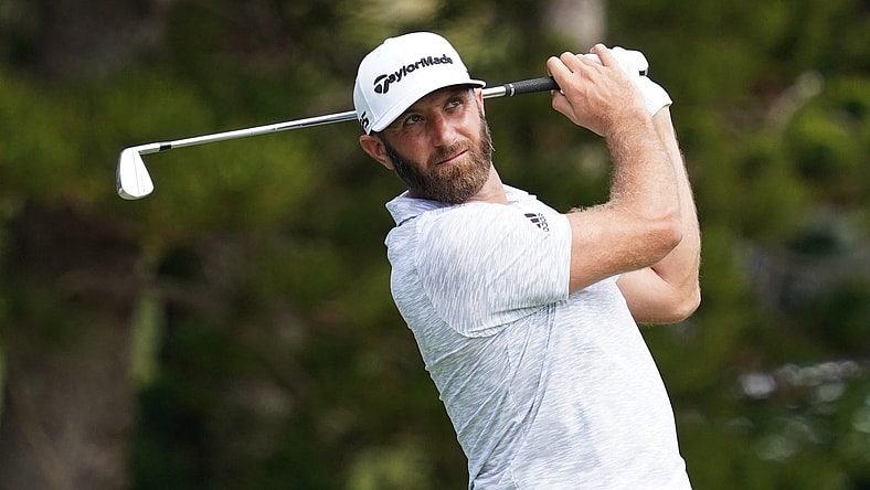 January 7, 2021; Maui, Hawaii, USA; Dustin Johnson hits a tee shot on the second hole during the first round of the Sentry Tournament of Champions golf tournament at Kapalua Resort - The Plantation Course. Mandatory Credit: Kyle Terada-USA TODAY Sports