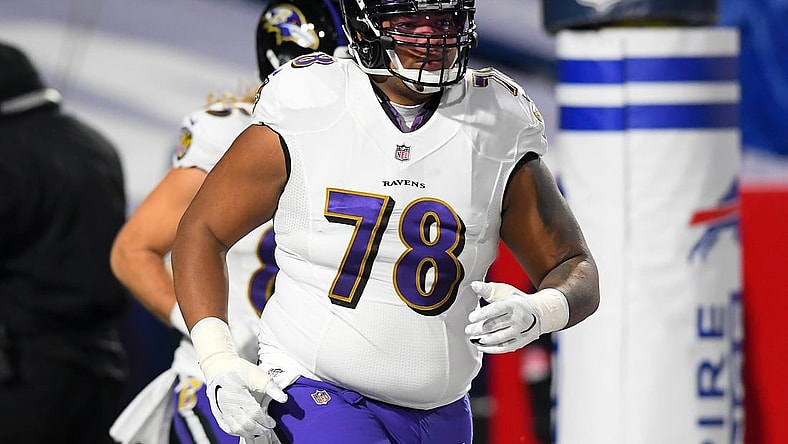 Jan 16, 2021; Orchard Park, New York, USA; Baltimore Ravens offensive tackle Orlando Brown (78) jogs on the field prior to an AFC Divisional Round game against the Buffalo Bills at Bills Stadium. Mandatory Credit: Rich Barnes-USA TODAY Sports