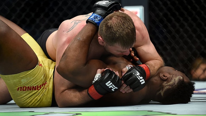 Jan 20, 2018; Boston, MA, USA; Stipe Miocic (red gloves) fights Francis Ngannou (blue gloves) during UFC 220 at the TD Garden. Mandatory Credit: Bob DeChiara-USA TODAY Sports