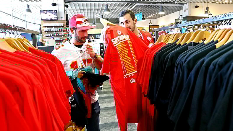 Feb 2, 2020; Miami Gardens, Florida, USA; Fans look throw merchandise before Super Bowl LIV between the San Francisco 49ers and the Kansas City Chiefs at Hard Rock Stadium. Mandatory Credit: Kim Klement-USA TODAY Sports