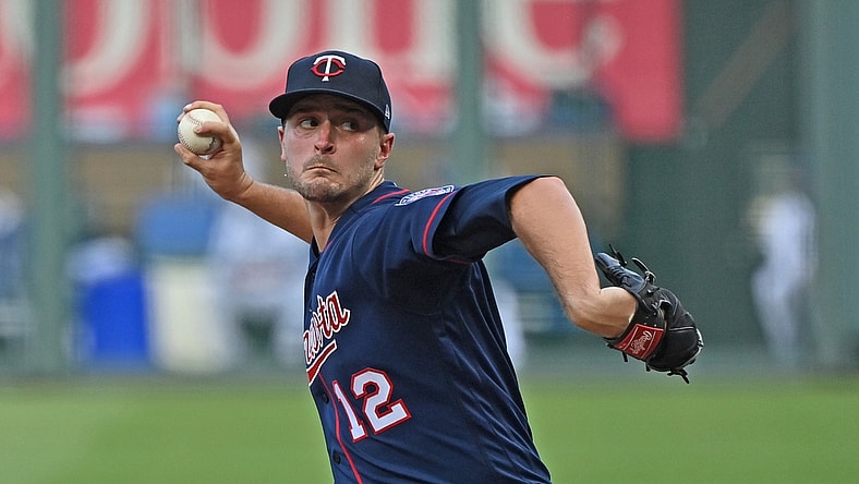 Aug 8, 2020; Kansas City, Missouri, USA; Minnesota Twins starting pitcher Jake Odorizzi (12) delivers a pitch during the first inning against the Kansas City Royals at Kauffman Stadium. Mandatory Credit: Peter Aiken-USA TODAY Sports