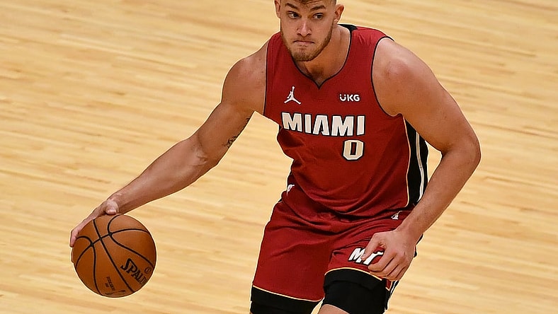 Dec 25, 2020; Miami, Florida, USA; Miami Heat center Meyers Leonard (0) dribbles the ball against the New Orleans Pelicans during the second half at American Airlines Arena. Mandatory Credit: Jasen Vinlove-USA TODAY Sports
