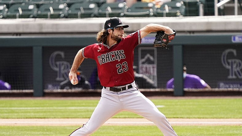 Feb 28, 2021; Scottsdale, Arizona, USA; Arizona Diamondbacks starting pitcher Zac Gallen (23) throws to the Colorado Rockies in the first inning during the spring training opener at Salt River Fields at Talking Stick. Mandatory Credit: Rob Schumacher/Arizona Republic-USA TODAY NETWORK