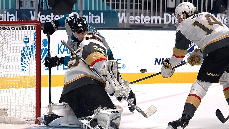 Mar 5, 2021; San Jose, California, USA; Vegas Golden Knights goalie Oscar Dansk (35) and defenseman Nicolas Hague (14) defend the goal against San Jose Sharks Joel Kellman (46) during the first period at SAP Center at San Jose. Mandatory Credit: Kelley L Cox-USA TODAY Sports