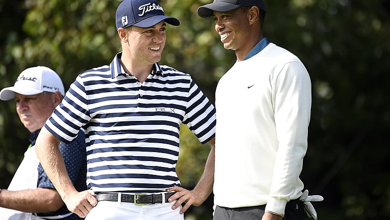 Sep 18, 2020; Mamaroneck, New York, USA; Justin Thomas and Tiger Woods talk on the 15th green during the second round of the U.S. Open golf tournament at Winged Foot Golf Club - West. Mandatory Credit: Danielle Parhizkaran-USA TODAY Sports