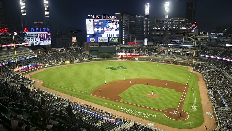 Apr 12, 2021; Atlanta, Georgia, USA; A general view of the number 44 on the outfield grass honoring the legacy of Atlanta Braves outfielder Hank Aaron (44) during a game against the Miami Marlins in the fourth inning at Truist Park. Mandatory Credit: Brett Davis-USA TODAY Sports