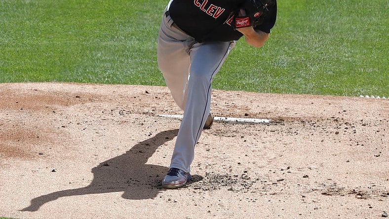 Apr 18, 2021; Cincinnati, Ohio, USA; Cleveland Indians starting pitcher Shane Bieber (57) throws against the Cincinnati Reds during the first inning at Great American Ball Park. Mandatory Credit: David Kohl-USA TODAY Sports