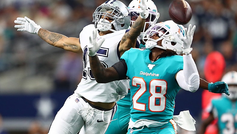 Sep 22, 2019; Arlington, TX, USA; Dallas Cowboys receiver Devin Smith (15) can not make the catch in the second quarter against Miami Dolphins safety Bobby McCain (28) at AT&T Stadium. Mandatory Credit: Matthew Emmons-USA TODAY Sports
