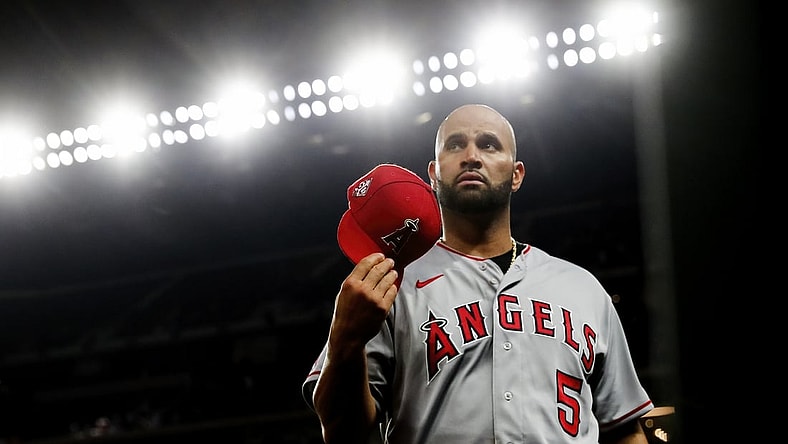 Apr 27, 2021; Arlington, Texas, USA;  Los Angeles Angels first baseman Albert Pujols (5) reacts during the game against the Texas Rangers at Globe Life Field. Mandatory Credit: Kevin Jairaj-USA TODAY Sports
