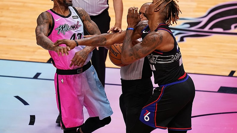 May 13, 2021; Miami, Florida, USA; Miami Heat forward Udonis Haslem (40) and Philadelphia 76ers center Dwight Howard (39) get into an altercation during the first half at American Airlines Arena. Mandatory Credit: Jasen Vinlove-USA TODAY Sports