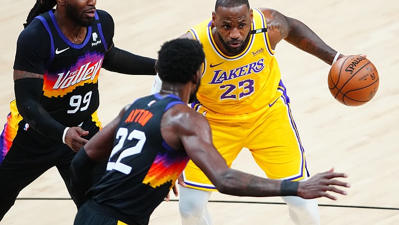 Jun 1, 2021; Phoenix, Arizona, USA; Los Angeles Lakers forward LeBron James (23) drives to the basket against the Phoenix Suns in the first half during game five in the first round of the 2021 NBA Playoffs at Phoenix Suns Arena. Mandatory Credit: Mark J. Rebilas-USA TODAY Sports