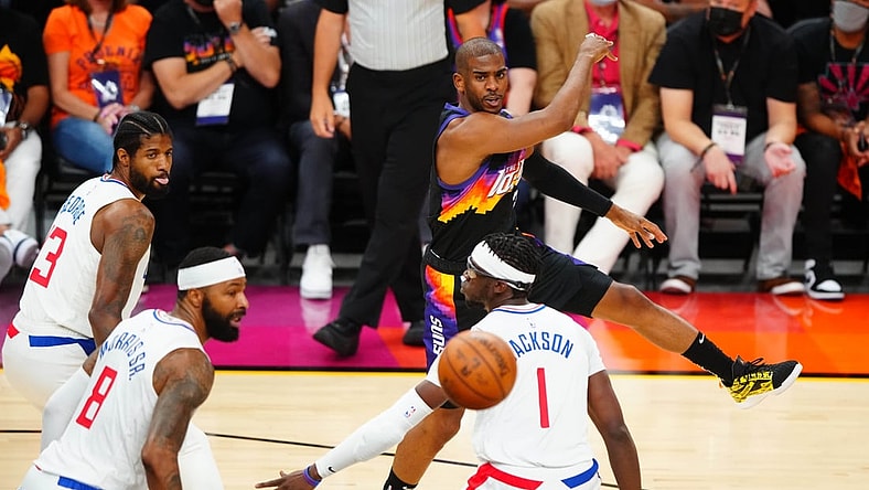 Jun 28, 2021; Phoenix, Arizona, USA; Phoenix Suns guard Chris Paul passes the ball against the Los Angeles Clippers in the first half during game five of the Western Conference Finals for the 2021 NBA Playoffs at Phoenix Suns Arena. Mandatory Credit: Mark J. Rebilas-USA TODAY Sports