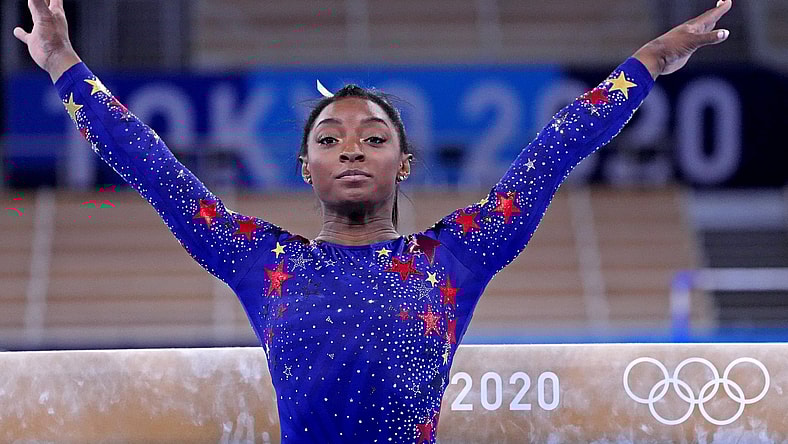 Simone Biles out of Team USA gymnastics final, coach cites 'mental issue' as reason