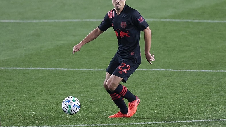 Oct 28, 2020; Harrison, New Jersey, USA; New York Red Bulls midfielder Florian Valot (22) plays the ball during the first half against the New England Revolution at Red Bull Arena. Mandatory Credit: Vincent Carchietta-USA TODAY Sports