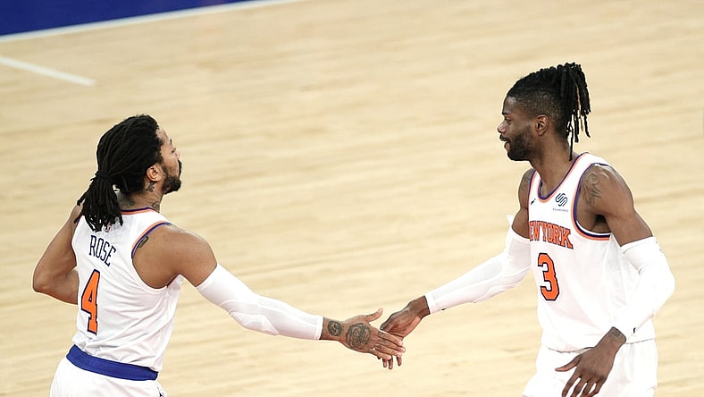 Apr 20, 2021; New York, New York, USA; Nerlens Noel #3 and Derrick Rose #4 of the New York Knicks high-five during the second half against the Charlotte Hornets at Madison Square Garden. Mandatory Credit: Sarah Stier/POOL PHOTOS-USA TODAY Sports