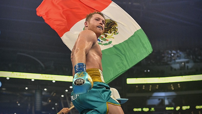 May 8, 2021; Arlington, Texas, USA; Boxer Canelo Alvarez celebrates defeating Billy Joe Saunders during a super middleweight boxing title fight at AT&T Stadium. Mandatory Credit: Jerome Miron-USA TODAY Sports