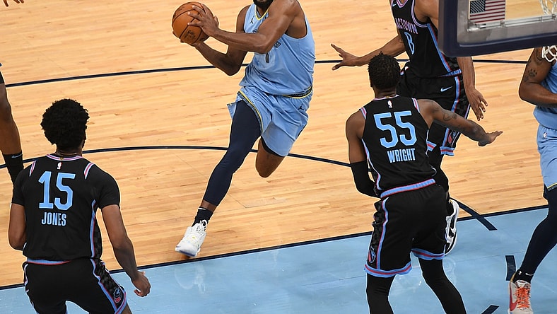 May 14, 2021; Memphis, Tennessee, USA; Memphis Grizzlies forward Justise Winslow (7) drives to the basket during the first quarter against the Sacramento Kings at FedExForum. Mandatory Credit: Christopher Hanewinckel-USA TODAY Sports