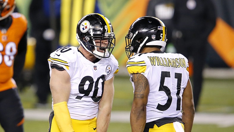 Dec 21, 2020; Cincinnati, Ohio, USA;  Pittsburgh Steelers outside linebacker T.J. Watt (90) celebrates with inside linebacker Avery Williamson (51) during the third quarter at Paul Brown Stadium. Mandatory Credit: Joseph Maiorana-USA TODAY Sports