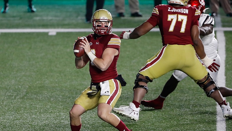 Nov 28, 2020; Chestnut Hill, Massachusetts, USA; Boston College Eagles quarterback Dennis Grosel (6) looks to pass against the Louisville Cardinals during the second half at Alumni Stadium. Mandatory Credit: Winslow Townson-USA TODAY Sports