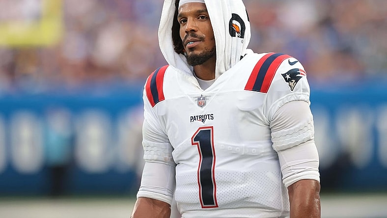 Aug 29, 2021; East Rutherford, New Jersey, USA; New England Patriots quarterback Cam Newton (1) looks on during the first half against the New York Giants at MetLife Stadium. Mandatory Credit: Vincent Carchietta-USA TODAY Sports