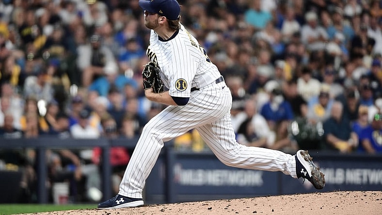 Oct 8, 2021; Milwaukee, Wisconsin, USA; Milwaukee Brewers starting pitcher Corbin Burnes (39) pitches in the fourth inning against the Atlanta Braves during game one of the 2021 NLDS at American Family Field. Mandatory Credit: Benny Sieu-USA TODAY Sports