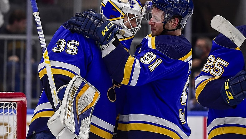 Oct 25, 2021; St. Louis, Missouri, USA; St. Louis Blues right wing Vladimir Tarasenko (91) celebrates with goaltender Ville Husso (35) after the Blues defeated the Los Angeles Kings at Enterprise Center. Mandatory Credit: Jeff Curry-USA TODAY Sports