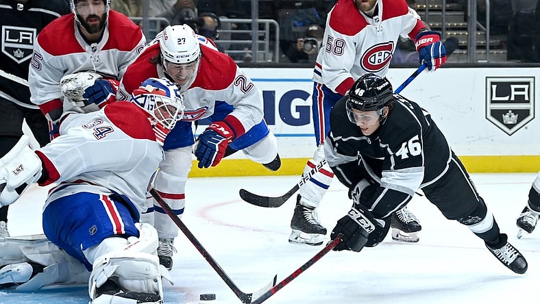 Oct 30, 2021; Los Angeles, California, USA; Montreal Canadiens goaltender Jake Allen (34) blocks a shot by Los Angeles Kings center Blake Lizotte (46) in the second period of the game at Staples Center. Mandatory Credit: Jayne Kamin-Oncea-USA TODAY Sports