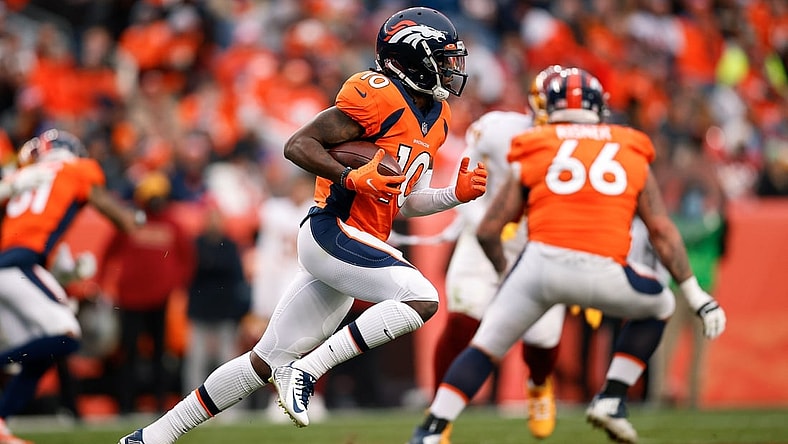 Oct 31, 2021; Denver, Colorado, USA; Denver Broncos wide receiver Jerry Jeudy (10) runs the ball in the fourth quarter against the Washington Football Team at Empower Field at Mile High. Mandatory Credit: Isaiah J. Downing-USA TODAY Sports
