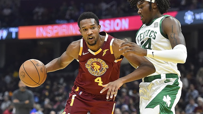 Nov 15, 2021; Cleveland, Ohio, USA; Cleveland Cavaliers center Evan Mobley (4) drives against Boston Celtics center Robert Williams III (44) in the second quarter at Rocket Mortgage FieldHouse. Mandatory Credit: David Richard-USA TODAY Sports
