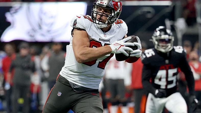 Dec 5, 2021; Atlanta, Georgia, USA; Tampa Bay Buccaneers tight end Rob Gronkowski (87) scores a touchdown during the second quarter against the Atlanta Falcons at Mercedes-Benz Stadium. Mandatory Credit: Jason Getz-USA TODAY Sports