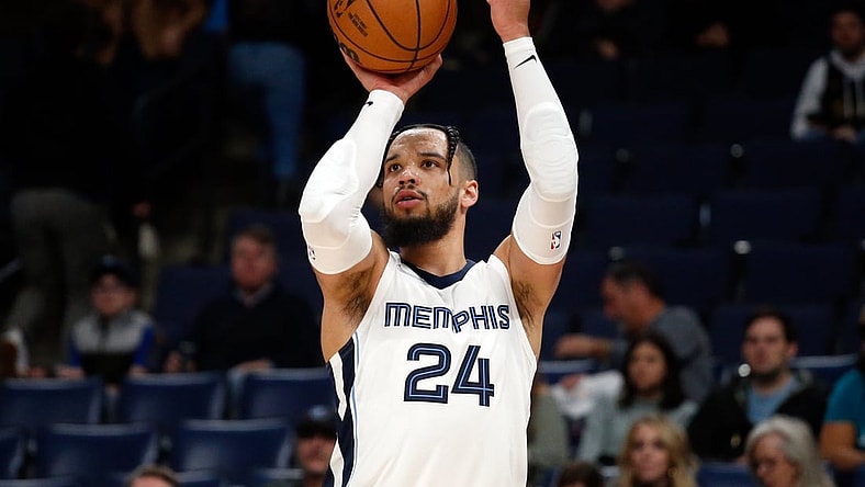 Nov 24, 2021; Memphis, Tennessee, USA; Memphis Grizzles guard Dillon Brooks (24) shoots for three during the second half against the Toronto Raptors at FedExForum. Mandatory Credit: Petre Thomas-USA TODAY Sports