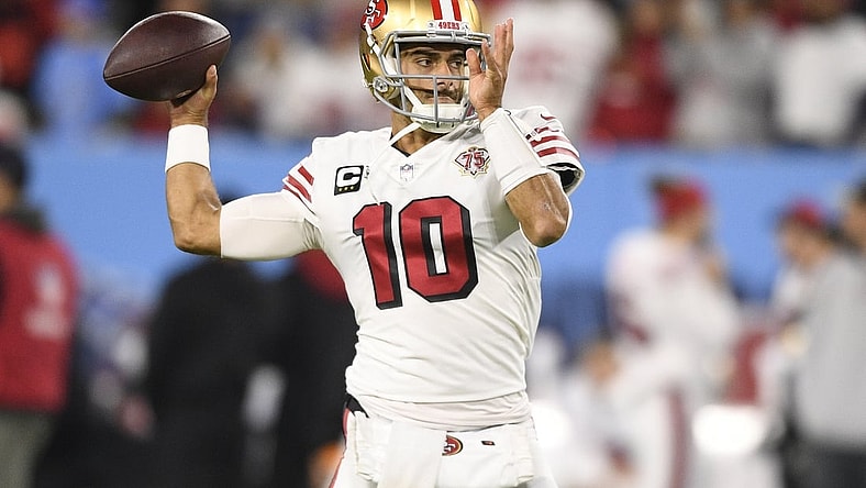 Dec 23, 2021; Nashville, Tennessee, USA;  San Francisco 49ers quarterback Jimmy Garoppolo (10) throws a pass during pre-game warmups before their game against the Tennessee Titans at Nissan Stadium. Mandatory Credit: Steve Roberts-USA TODAY Sports