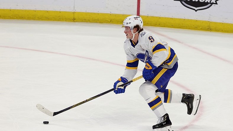 Feb 28, 2021; Buffalo, New York, USA; Buffalo Sabres center Jack Eichel (9) skates up the ice with the puck against the Philadelphia Flyers during the second period at KeyBank Center. Mandatory Credit: Timothy T. Ludwig-USA TODAY Sports