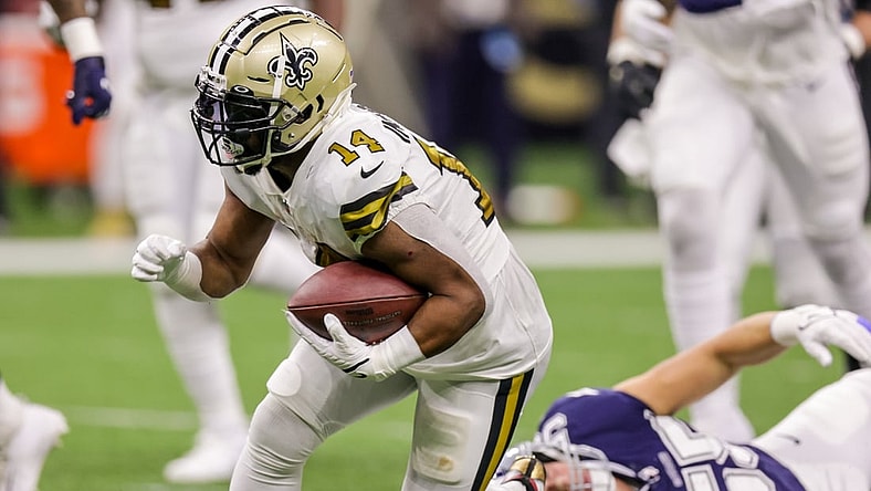 Dec 2, 2021; New Orleans, Louisiana, USA; New Orleans Saints running back Mark Ingram II (14) and Dallas Cowboys linebacker Leighton Vander Esch (55) during the first half at Caesars Superdome. Mandatory Credit: Stephen Lew-USA TODAY Sports