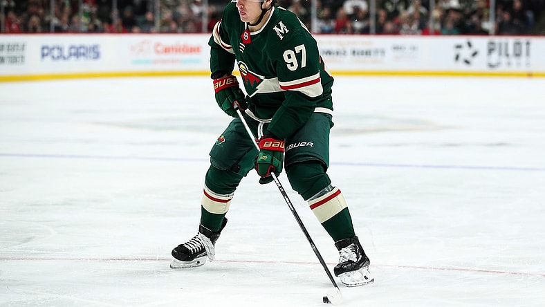 Dec 16, 2021; Saint Paul, Minnesota, USA; Minnesota Wild left wing Kirill Kaprizov (97) skates with the puck against the Buffalo Sabres in the second period at Xcel Energy Center. Mandatory Credit: David Berding-USA TODAY Sports