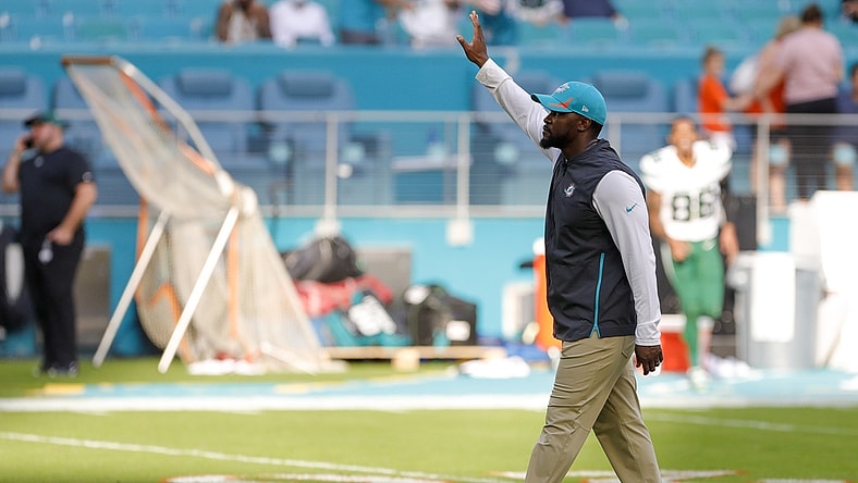 Dec 19, 2021; Miami Gardens, Florida, USA; Miami Dolphins head coach Brian Flores waves at fans after winning the game against the New York Jets at Hard Rock Stadium. Mandatory Credit: Sam Navarro-USA TODAY Sports