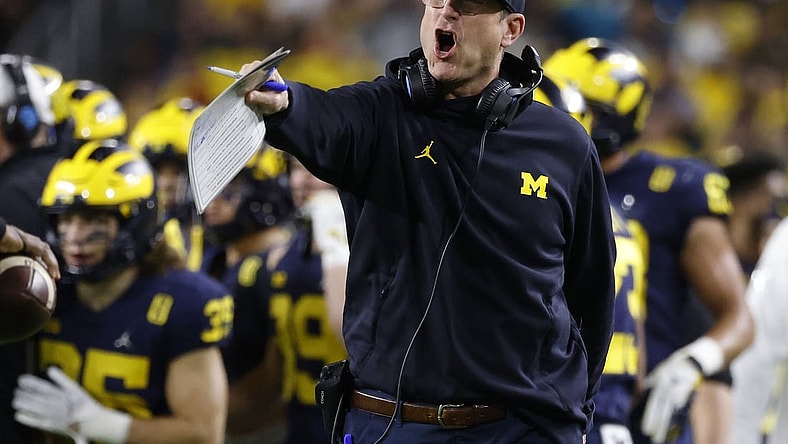 Dec 31, 2021; Miami Gardens, Florida, USA; Michigan Wolverines head coach Jim Harbaugh reacts from the sideline during the second half in the Orange Bowl college football CFP national semifinal game against the Georgia Bulldogs at Hard Rock Stadium. Mandatory Credit: Rhona Wise-USA TODAY Sports