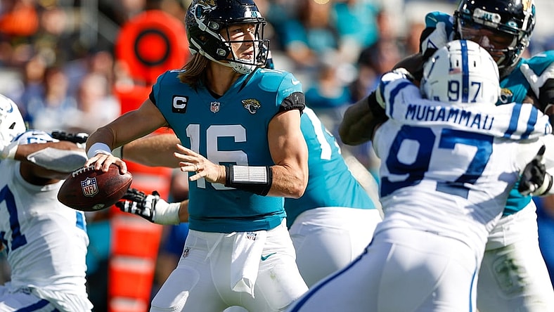 Jan 9, 2022; Jacksonville, Florida, USA; Jacksonville Jaguars quarterback Trevor Lawrence (16) drops back to pass in the second quarter against the Indianapolis Colts at TIAA Bank Field. Mandatory Credit: Nathan Ray Seebeck-USA TODAY Sports