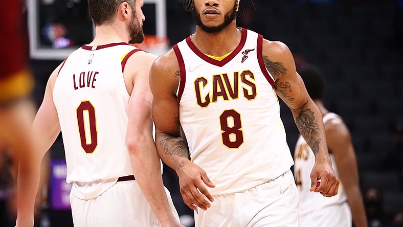 Jan 10, 2022; Sacramento, California, USA; Cleveland Cavaliers forward Lamar Stevens (8) celebrates with forward Kevin Love (0) after a play against the Sacramento Kings during the third quarter at Golden 1 Center. Mandatory Credit: Kelley L Cox-USA TODAY Sports