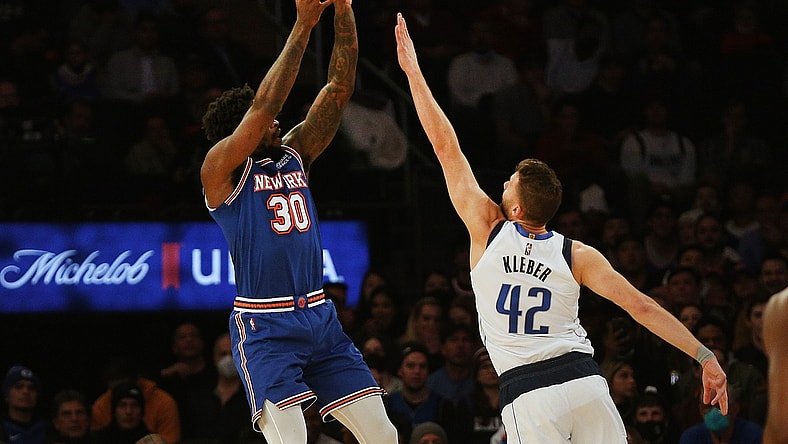 Jan 12, 2022; New York, New York, USA; New York Knicks forward Julius Randle (30) takes a shot while being defended by Dallas Mavericks forward Maxi Kleber (42) during the first half at Madison Square Garden. Mandatory Credit: Andy Marlin-USA TODAY Sports